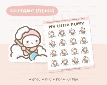 Puede incluir: Pegatinas imprimibles para planificadores con un lindo personaje rosa con una escoba azul, que está quitando la nieve. Las pegatinas están diseñadas con un fondo blanco y están dispuestas en una cuadrícula. El texto "My Little Puffy" se muestra en la parte superior de la hoja.