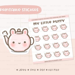 Puede incluir: Hoja de pegatinas imprimibles con una tetera rosa con orejas de conejo. Las pegatinas están etiquetadas como "Printable Stickers" e incluyen opciones de tipo de archivo. La dirección del sitio web es www.MYLITTLEPUFFY.com.