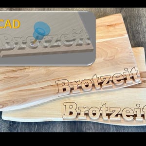 May include: Wooden cutting boards with the word "Brotzeit" carved into them. The boards are light brown with a natural wood grain. A CAD rendering shows the design process. The word "CAD" is in yellow.