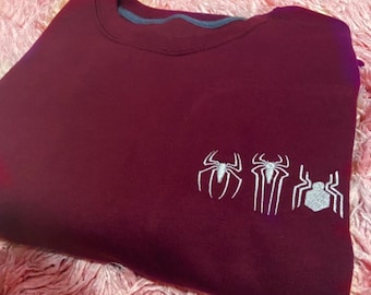 Suéter bordado três Spiderman Spiderverse