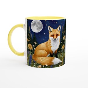 May include: A yellow and white ceramic mug featuring a fox illustration. The fox is sitting in a field of flowers beneath a full moon and stars. The mug has a yellow rim.