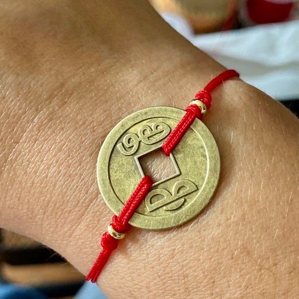 lucky bracelet.  Red string bracelet.  String bracelet for luck.  Luck.  Money bracelet.  Chinese coin bracelet.  Chinese coin