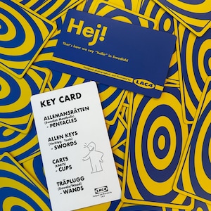 May include: A collection of playing cards with a blue and yellow concentric circle design. One card reads "Hej!" with the text "That's how we say "hello" in Swedish!" Another card is labeled "KEY CARD" with Swedish terms and illustrations.