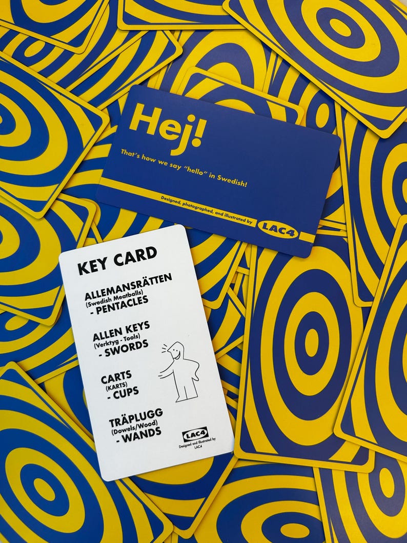May include: A collection of playing cards with a blue and yellow concentric circle design. One card reads "Hej!" with the text "That's how we say "hello" in Swedish!" Another card is labeled "KEY CARD" with Swedish terms and illustrations.