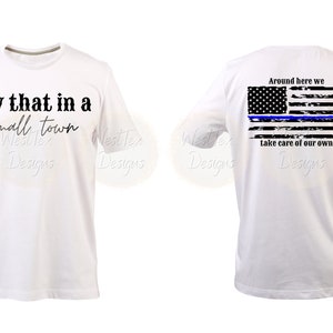 May include: White t-shirt with the text "Try that in a small town" on the front and a distressed American flag with a blue line on the back. The text on the back says "Around here we take care of our own."