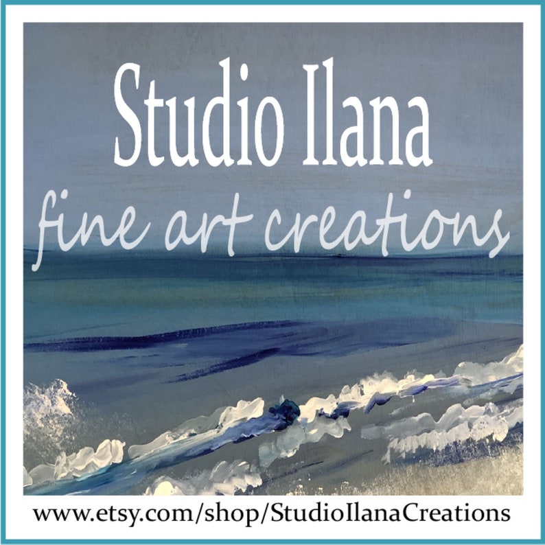 May include: Studio Ilana fine art creations, a logo with a stylized text design over a painting of a blue ocean with white waves crashing on the shore.
