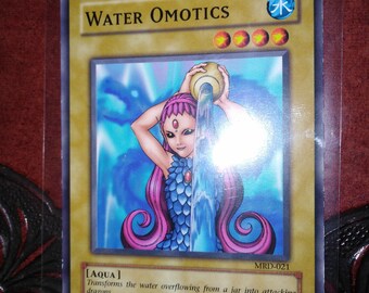 yugioh card water omotics Amazon.com: Yu-Gi-Oh! - Water Omotics (MRD-021) - Metal Raiders - Unlimited  Edition main image 1