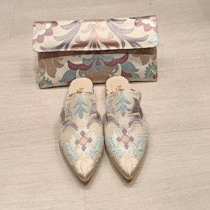 Handmade slippers and clutch bag