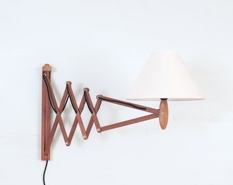 Large scissor concertina wall lamp by Erik Hansen.