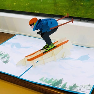 Biglietto pop-up sciistico, biglietto tagliato al laser con sciatore 3D, biglietto di compleanno
