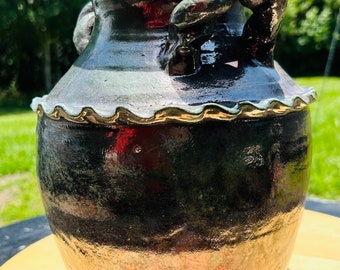 One Of the Kind Raku Large Round Iridescent Wavy squirt Vase with twisted handles on top R-003b