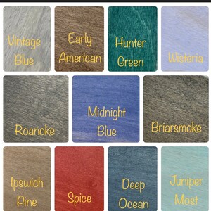 May include: A color chart showing 12 different wood stain colors. The colors are: Vintage Blue, Early American, Hunter Green, Wisteria, Roanoke, Midnight Blue, Briarsmoke, Ipswich Pine, Spice, Deep Ocean, Juniper Most.