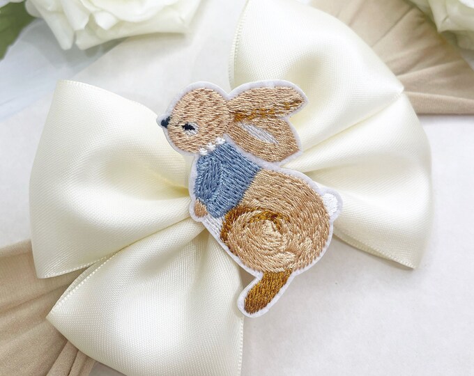Cream Bow Baby Headband: Embroidered Rabbit Patch