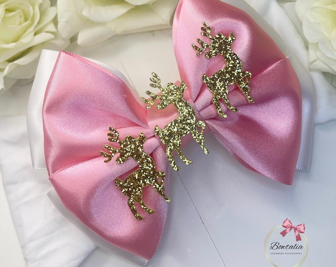 Pink Reindeer Christmas Bow Headband: Festive Baby Hair Accessory