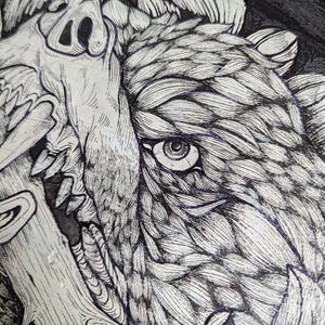 May include: A detailed black and white illustration of a wild boar's face, with intricate line work. The artwork includes a skull and foliage, creating a dramatic design. The image is a close-up, showing fine details.