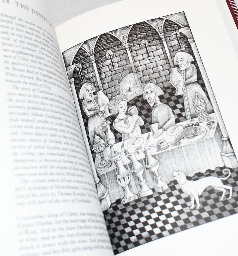 May include: An open book with a black and white illustration depicting a medieval scene. The image shows figures around a table, a dog, and architectural details. The text "THE DEEDS OF" is visible at the top of the page.