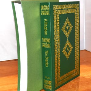May include: Two hardcover books. The book on the right is green with gold decorative accents and the title "The Diaries" by Allingham. The book on the left is a solid green color.