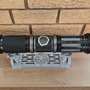 Lightsaber stand Sith inspired universal workbench style saber stand! Fits both Savi&#39;s Workshop Lightsabers & Legacy lightsabers!