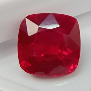 May include: A set of three ceramic mugs with a speckled, matte finish. The mugs are in shades of cream, light gray, and dark gray. Each mug has a simple, minimalist design, perfect for coffee or tea.