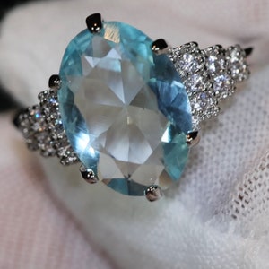 Blue Oval Diamond Ring