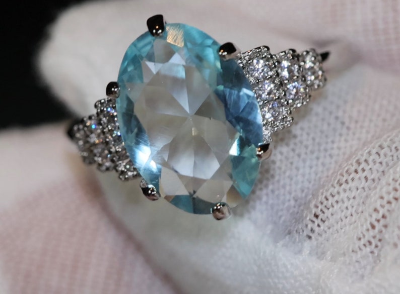 Blue Oval Diamond Ring