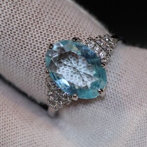 Blue Oval Diamond Ring