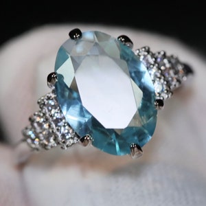 Blue Oval Diamond Ring