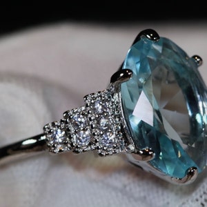 Blue Oval Diamond Ring