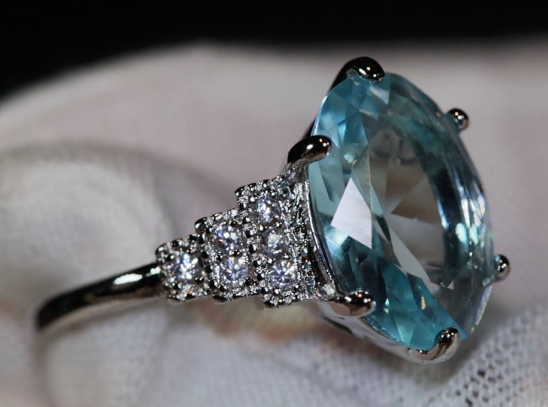Blue Oval Diamond Ring