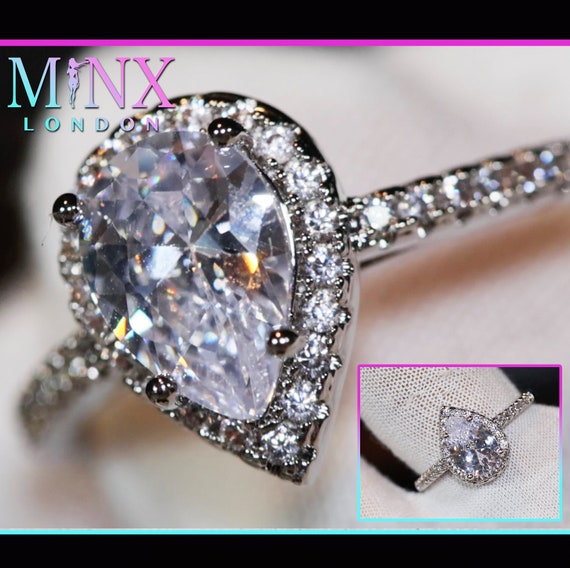 Platinum Halo Engagement Ring with Pear Shaped Diamond Centre Stone