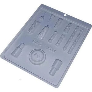 May include: A gray plastic mold for making chocolate makeup items. The mold has 10 cavities, including lipstick, eyeshadow, blush, eyeliner, and mascara. The mold is labeled with the text "9341", "BWB", and "PO".