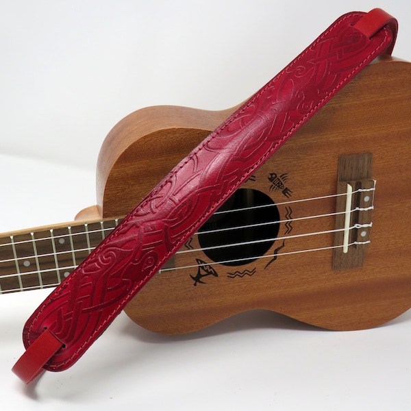 Correa acolchada para ukelele o mandolina con estampado celta en relieve en rojo