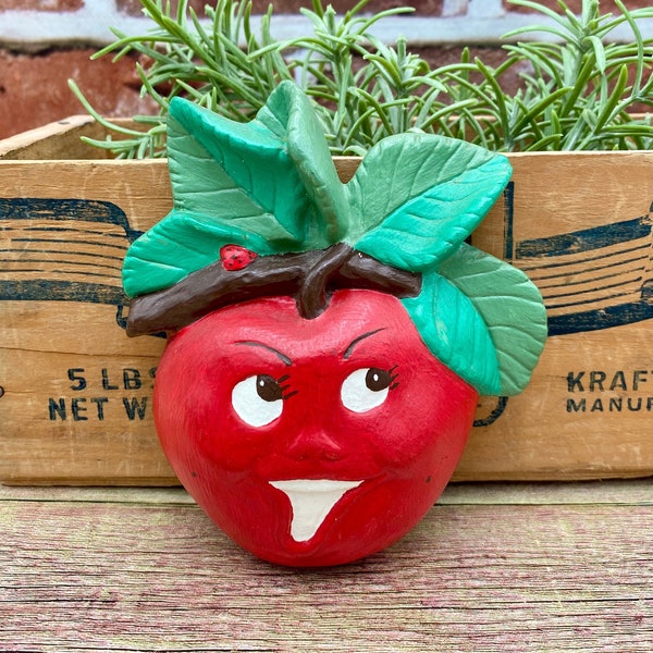 apple anthropomorphic chalkware wall art