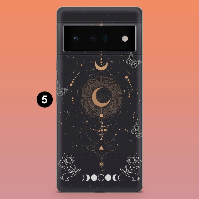 May include: Black phone case with a celestial design featuring a crescent moon, stars, butterflies, and hands. The case has a matte finish and a camera cutout at the top. The design is in gold and white against a black background.