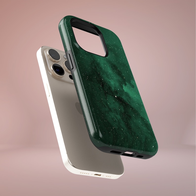 May include: A smartphone case with a dark green, marbled design and a black border. The case is shown next to a silver smartphone. The case has a glossy finish and a speckled pattern, giving it a unique, artistic look.