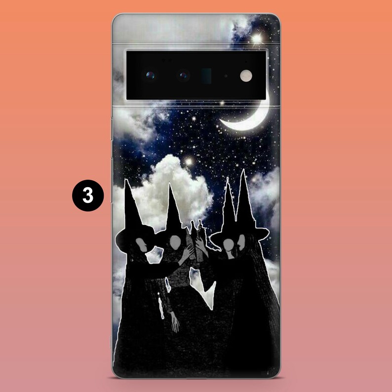 May include: A phone case featuring a night sky scene with a crescent moon, stars, and clouds. Silhouetted figures of three witches in tall hats and cloaks are in the foreground, creating a Halloween theme.