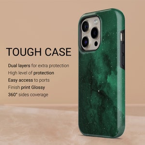 May include: A green and black phone case with a glossy finish. The case has a nebula-like design and the text "TOUGH CASE". Features include dual layers for extra protection, easy access to ports, and 360&deg; side coverage.