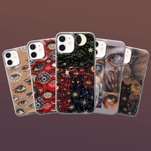 May include: Five phone cases with distinctive artistic designs. The cases display eye-themed illustrations in brown, red, and blue, and a black cat design under a starry night sky. The cases are clear with a protective bumper, offering a stylish and protective design.