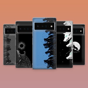 May include: A collection of phone cases with wolf-themed designs. The cases feature illustrations of wolves howling, a wolf silhouette under a full moon, and a series of wolf heads. The color palette includes black, white, and blue.