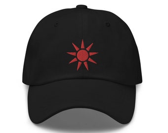 May include: A black baseball cap with a red embroidered sun design.