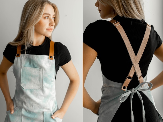Apron with outlet leather straps