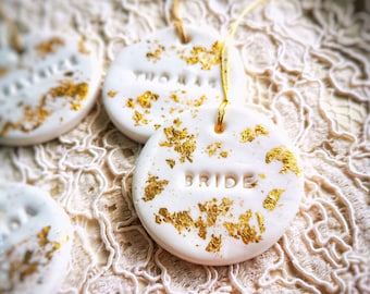 Personalized wedding favors with gold leaf | Handmade ceramic name tags | gold foil wedding place tags | round ceramic keepsakes/magnets