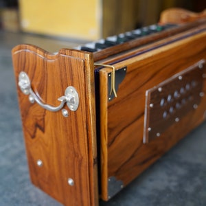 Dolphin Harmonium 2.5 Octave, 32 Keys, Portable Hand Pumped Kirtan Instrument, Teak Wood with Carry Case | Mayapurstore image 5
