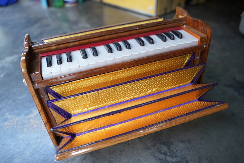 Dolphin Harmonium 2.5 Octave, 32 Keys, Portable Hand Pumped Kirtan Instrument, Teak Wood with Carry Case | Mayapurstore image 13