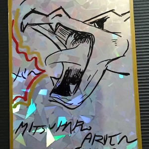Carte Pokémon autographe de Mitsuhiro Arita et fanart de Charizard