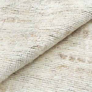 Hand-Knotted Ivory Wool Rug: Minimalist Cream Carpet