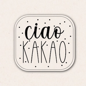 May include: White sticker with black text that says "ciao kakao" in a handwritten font.