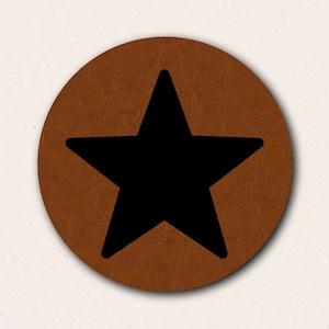 May include: A brown leather coaster with a black star in the center.