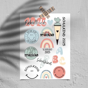May include: A set of colorful stickers with the text "Schulkind 2025" and other school-related designs. The stickers feature a rainbow, a pencil, a graduation cap, and a smiley face.