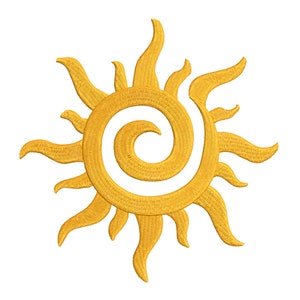 May include: A gold embroidered sun with a spiral design in the center. The sun has a stylized, flame-like design.